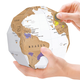 Illustration for article titled A Scratch-Off Globe Helps Keep Track of Your Country Hopping